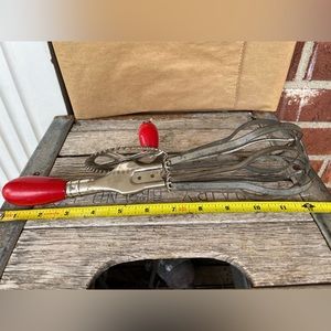 Antique/vintage handheld crank mixer/egg beater with red wooden handle